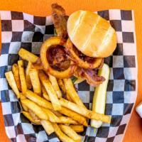 Jack Daniels Bbq Burger · 7 oz. Topped with jack Daniels BBQ sauce, cheddar cheese, bacon and sweet onion rings, tomat...