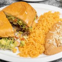 Chorizo Torta · Includes cheese tomato lettuce beans guacamole and sour cream. extra meat for an additional ...