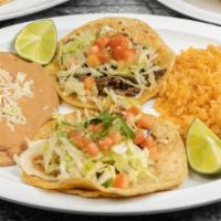  Tacos Dinner · 2.- tacos with rice & beans
protein option 
steak
chicken
beef