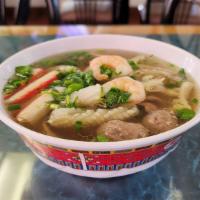 Pho - Tsunami (Combo) · Thin slices of beef, meatballs, tripe, shrimp meatballs, and squid in beef broth.