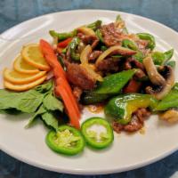 Mongolian Beef · Spicy, green onions, bell peppers mushrooms and jalapeño in delicious Mongolian sauce.