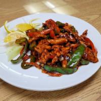 Mongolian Chicken · Spicy, green onions, bell peppers mushrooms and jalapeño in delicious Mongolian sauce.