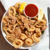 Fried Calamari · Our famous calamari hand-breaded and deep-fried to perfection.