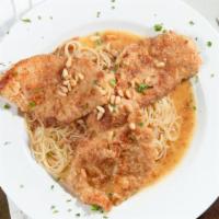 Chicken Pinoli · Boneless chicken breaded and pan-fried tossed in a lemon butter sauce with pine nuts served ...