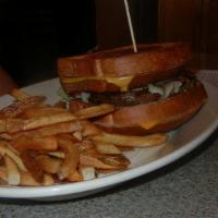 Grilled Cheese Burger · 8oz Angus Beef between two grilled cheese sandwiches topped with cheddar cheese. Try it with...