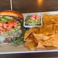 Guac Burger · 8oz Angus Beef Patty topped with guacamole, pico de gallo, fresh jalapenos and pepper jack c...