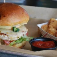 Jalapeno Ranch  Turkey Burger · Spicy cilantro ranch dressing, candied jalapeno's, pepper jack cheese, iceberg, onion, tomato