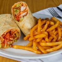 Buffalo Tender Wrap · Two Chicken Tenders Drenched in Buffalo Sauce & wrapped with Shredded Mozzarella, Lettuce, T...