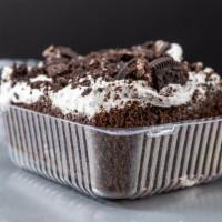 Oreo Crumb Cake Slice · Chocolate Cake with Whipped Topping and Oreo cookie cookie crumbs