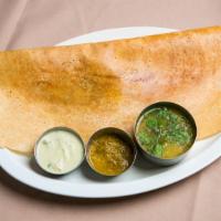 Plain Dosa · Vegan and gluten-free. A thin golden crepe, served with Sambar and Coconut Chutney.