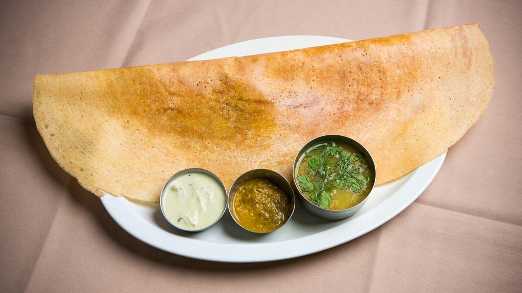 Plain Dosa · Vegan and gluten-free. A thin golden crepe, served with Sambar and Coconut Chutney.