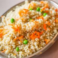 Quinoa · Vegan and gluten-free. With Sea Salt and Clove, garnished with Peas and Carrots.