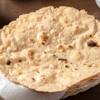 Tandoori Roti · Whole Wheat clay-oven baked round flat-bread. Vegan.