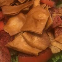 Fattoush Salad · Lettuce, tomato, cucum., pita chips and dressing.