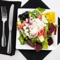 Greek Salad · Romaine lettuce, tomatoes, red onions, black olives, feta cheese, mild peppers and beats.
