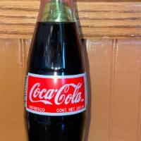 Coca - Cola  · Mexican coke.