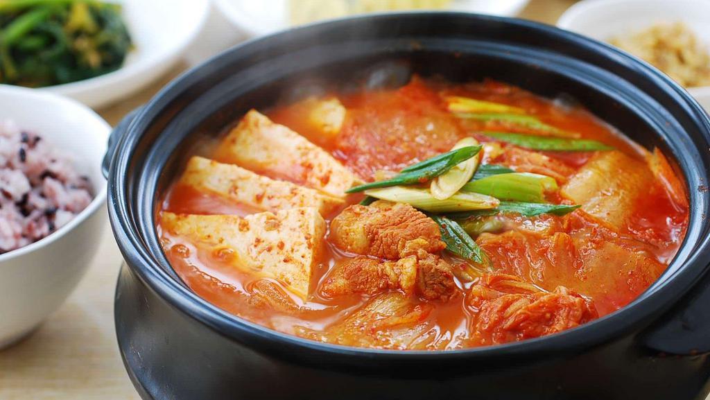 Kimchi Jjigae · Hot kimchi stew with broth.
