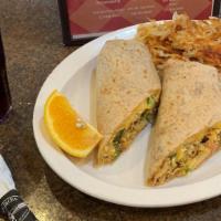 Mexican Wrap With Hash Browns · With chorizo, scrambled eggs, onions, green peppers, tomatoes, jalapeños and  shredded co-ja...