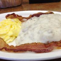 Sunrise  · 1/2 Biscuits and Sausage Gravy , two eggs, two pieces of bacon or links.