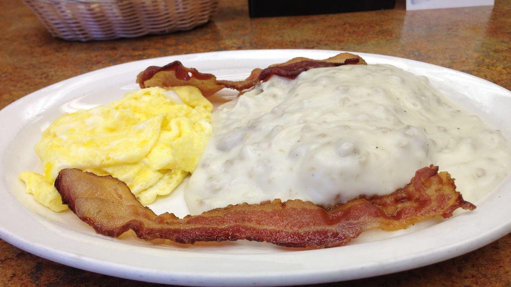 Sunrise  · 1/2 Biscuits and Sausage Gravy , two eggs, two pieces of bacon or links.