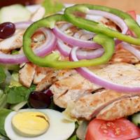Plain Or Cajun Grilled Chicken Salad · With tender grilled chicken on top of crisp greens, boiled egg, cucumbers, tomatoes, onions ...