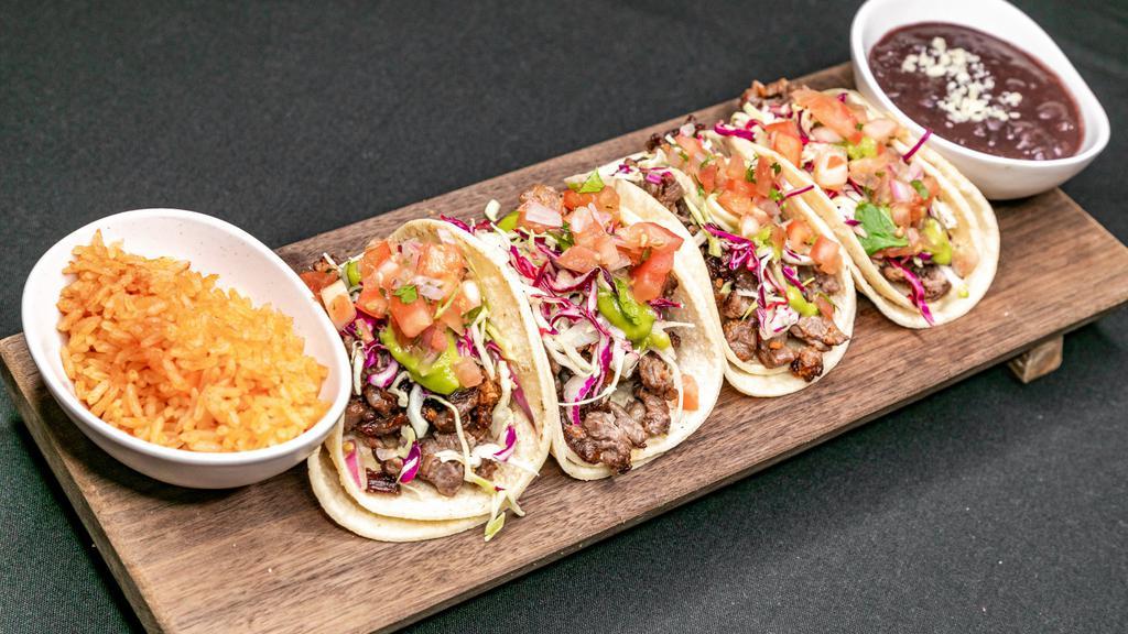 Tacos · Four delicious street tacos with rice and beans on the side. Select up to 2 varieties per order.