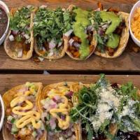 Family Tacos · 14 delicious street tacos with your choice of up to 3 varieties per order. Serves 4-5.