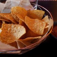 Salsa & Chips · Homemade salsa with tortilla chips fried in-house.