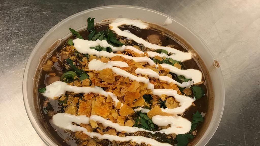 Vegetarian Chili · CHILI IS TOPPED WITH SOUR CREAM, CILANTRO MIX AND MAGIC TORTILLA DUST