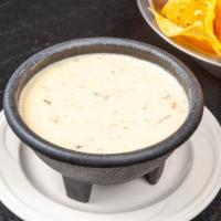 Quart Of Queso Espinaca · White queso with spinach.