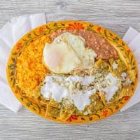 Chilaquiles With Huevos · Includes rice and beans. choice of red or green salsa.