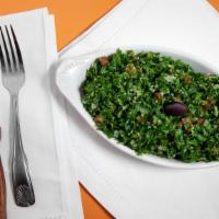 Large Tabbouli · Mixture of chopped parsley, tomatoes, onions, cracked wheat, tossed with our olive oil blend...