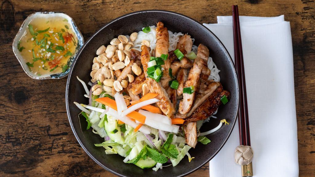 Grilled Chicken Vietnamese Noodle Salad · Vermicelli noodle, lettuce, cucumber, mint leaves, bean sprout, scallion, peanut, pickled carrot & daikon. Come with House fish sauce.