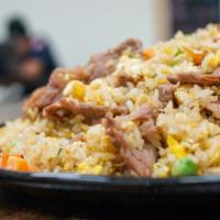 Beef Fried Rice · Carrot, peas, scallions, eggs.