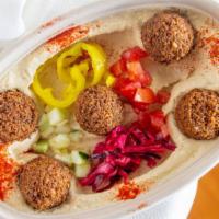 Hummus Bowl · Gluten free and vegan. 
Build your hummus(a blend of pureed chickpeas, tahini, garlic, and e...