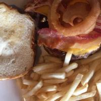 Road House Burger · Hickory smoked bacon sharp cheddar bbq sauce and onion rings on a pretzel bun. burgers serve...