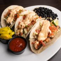 California Chicken Tacos · Grilled chicken lettuce pico avocado chopped bacon cheese and sriracha sauce. 3 tacos served...