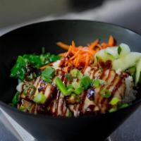 Pork Belly Bowl · Fresh rice topped with seared braised pork belly, lightly pickled carrots and cucumbers, sea...