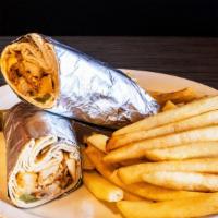 W4 Chicken Shawarma · Marinated and slow-cooked chicken thinly sliced and topped with pickles, potatoes and garlic...