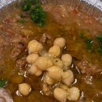 A6 Foul Mudammas 8 Oz · Vegetarian. Simmered fava beans in herbs and spices. Tossed with chopped parsley, onions, to...