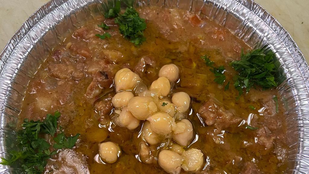 A6 Foul Mudammas 8 Oz · Vegetarian. Simmered fava beans in herbs and spices. Tossed with chopped parsley, onions, tomatoes, and lemon juice. Drizzled with extra virgin olive oil.