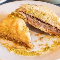 Baklava · A rich and sweet pastry made of layers of phyllo, filled with chopped nuts and sweetened wit...