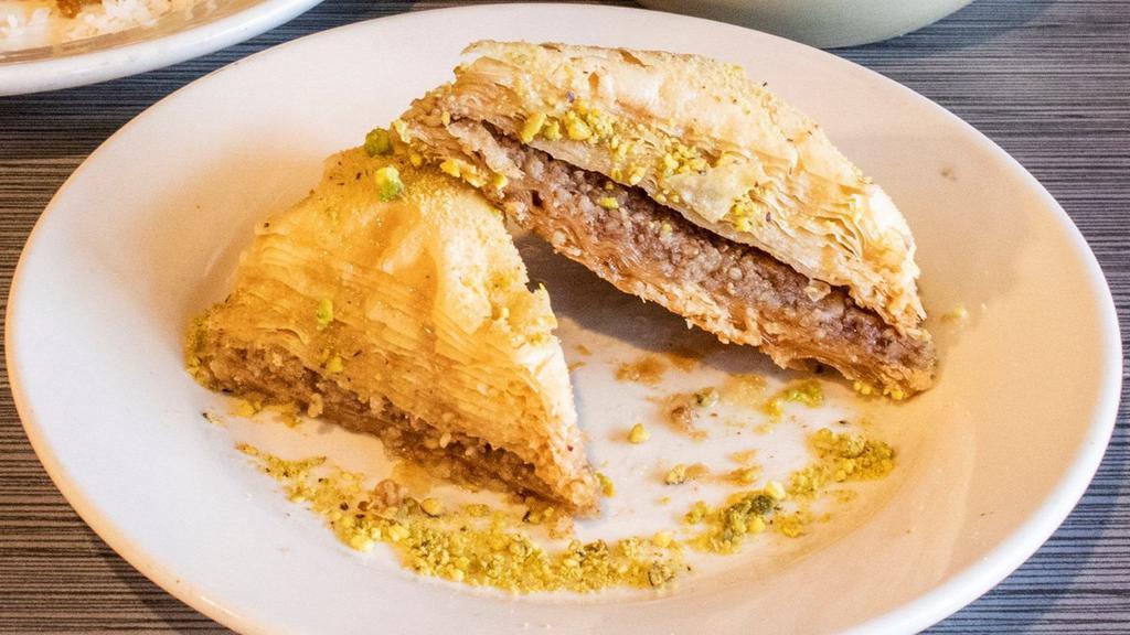 Baklava · A rich and sweet pastry made of layers of phyllo, filled with chopped nuts and sweetened with syrup.