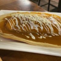 Tamales · Each. Homemade tamale, red or green sauce.
