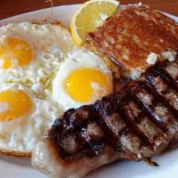 Steak & Eggs · Grilled steak - cooked to order, three eggs, potato and toast.