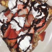 Pocket French Toast · Grilled French toast stuffed with sweet cream cheese then topped with 2 of your choices and ...