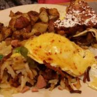 Cajun Benedict · Andouille sausage and poached eggs over grilled English muffins topped with our special home...