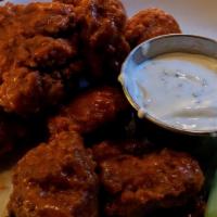 Wings · Slow baked then deep-fried, 10 bone-in wings tossed in your choice of sauce. Now available a...