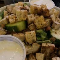 Caesar Salad · Vegetarian. Romaine lettuce tossed with caesar dressing, parmesan cheese & croutons