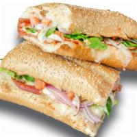 Italian Sandwich
 · Choice of dressing, ham capicola, salami, pepperoni, tomato, onion, lettuce, and cheese mix.